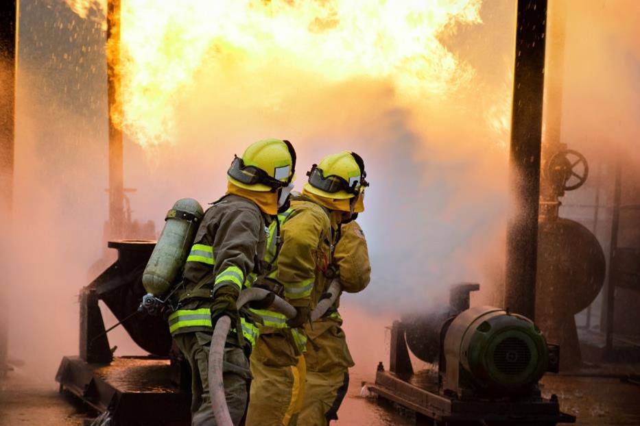 Firefighters putting out a fire at a business