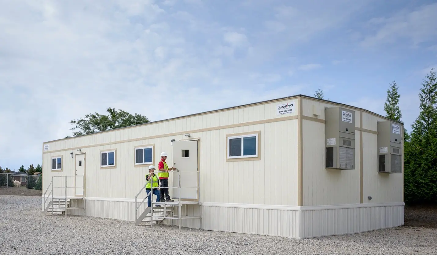 Workers at a modular building.