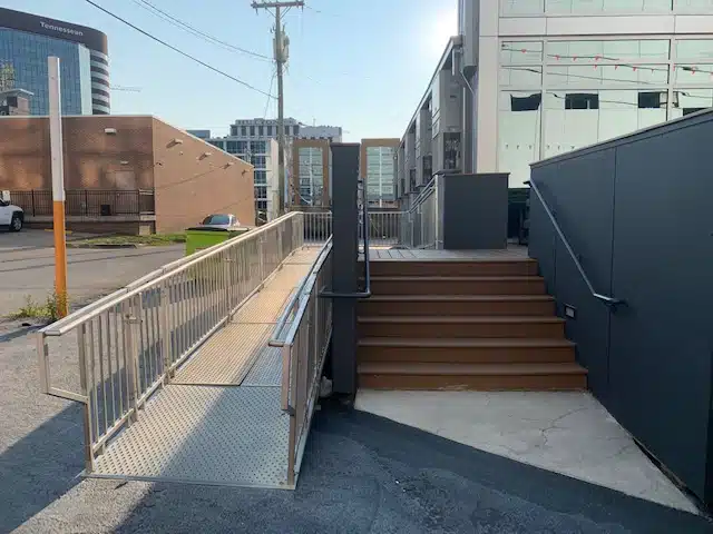 Ramp and stairs leading to Broadwest Nashville.