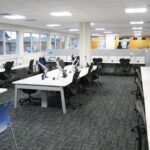 open work space with desks and chairs