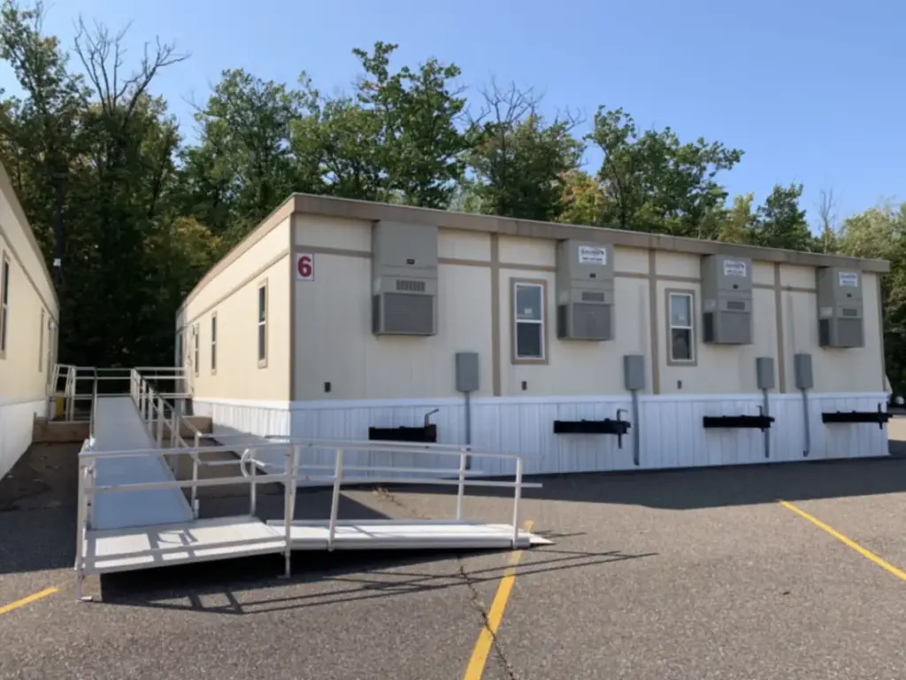 S Plex Modular Swing spaces with an ADA accessibility ramp attached