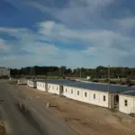 A collection of trailers at a worksite