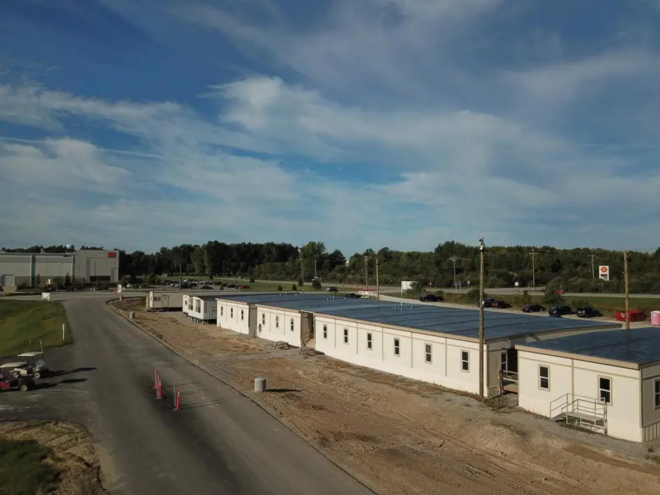 A collection of trailers at a worksite