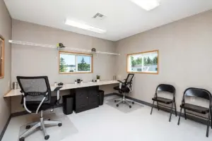 Interior mobile office with desks and chairs