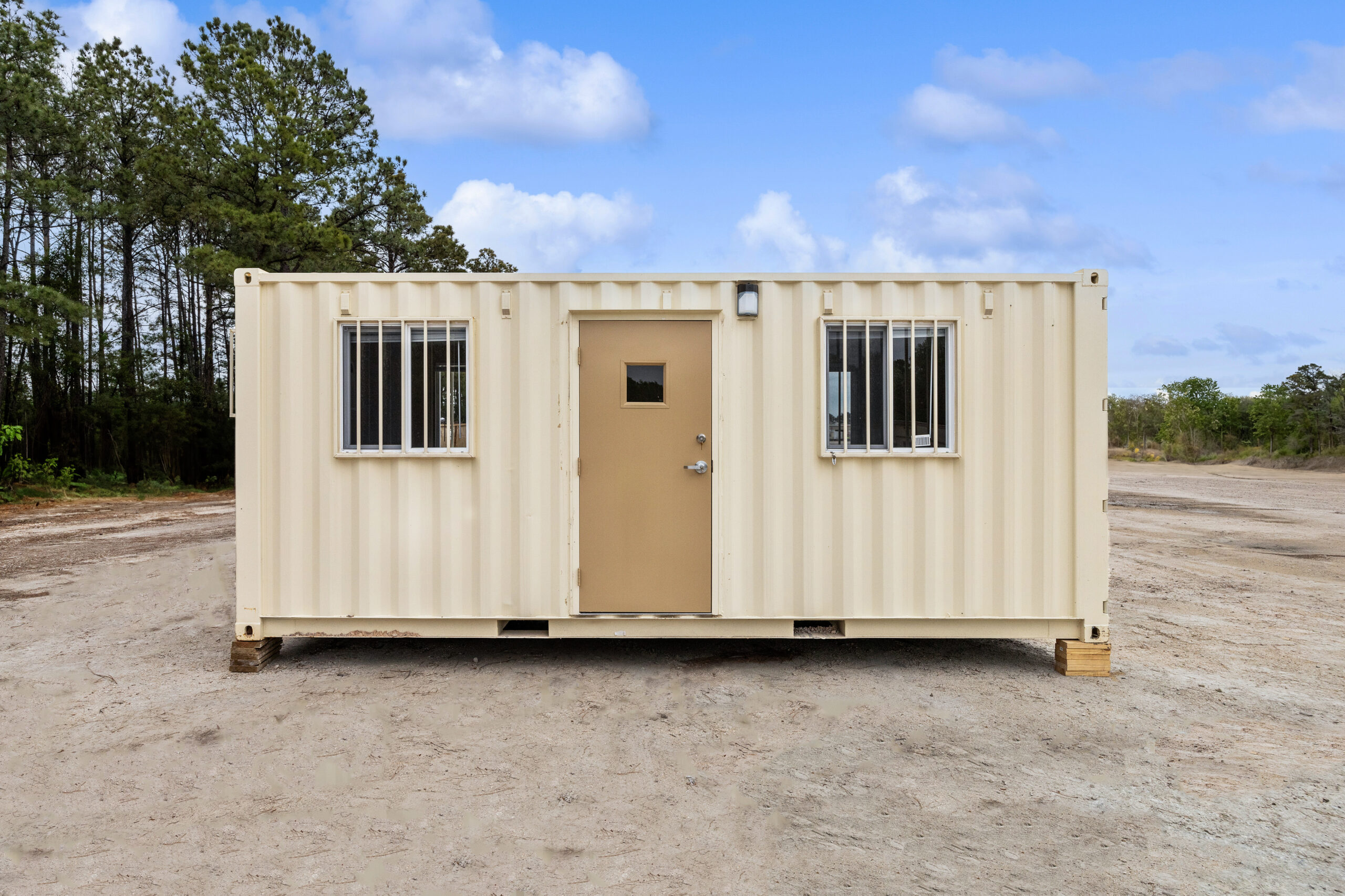 Exterior front view of a ground level office container
