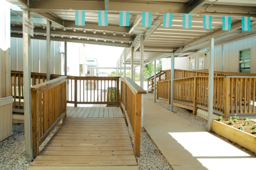 Custom deck and ramps outside of a portable classroom