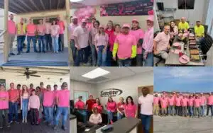 Employees wearing pink clothing.