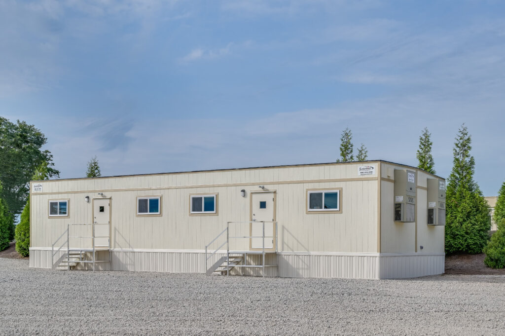 24x60 mobile office with steps leading up to two entry doors.