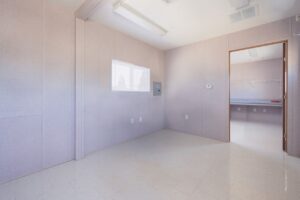 An unfurnished interior of a mobile office.