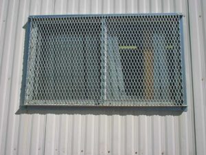 A screen covering a window on a mobile office.