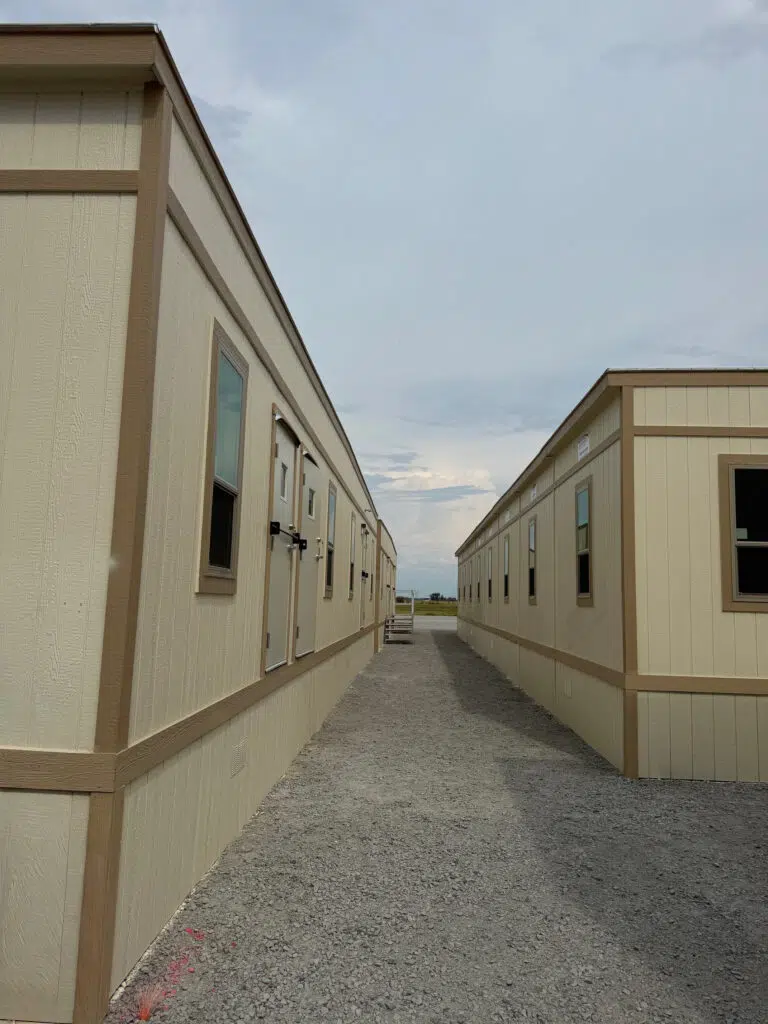 Row of mobile offices outside.