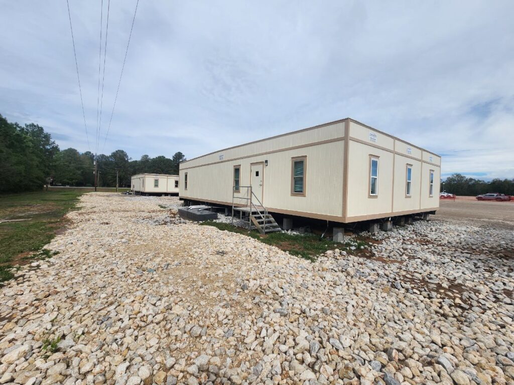 Stairs leadng to mobile office at a job site.