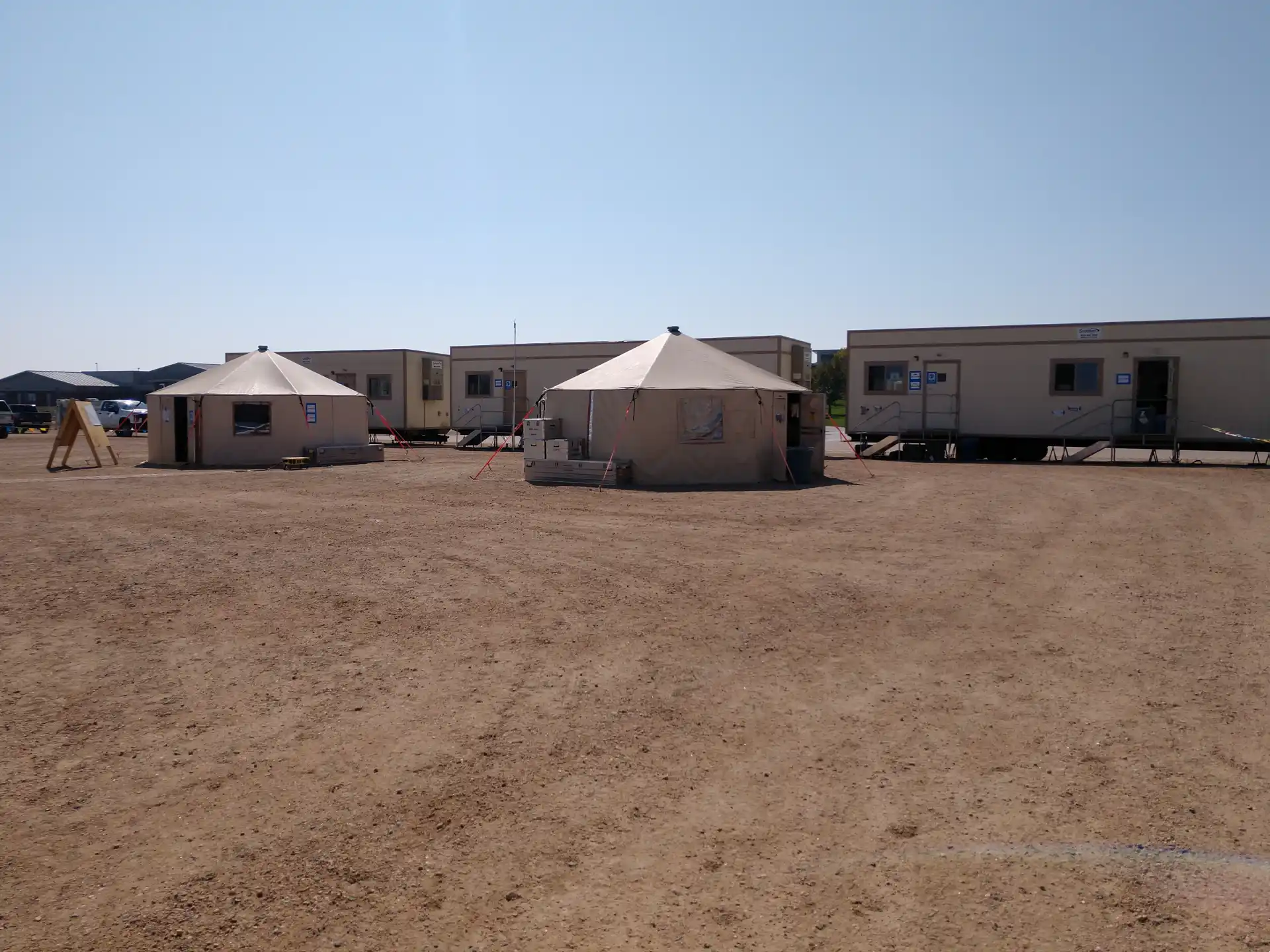 tents and ground level mobile offices