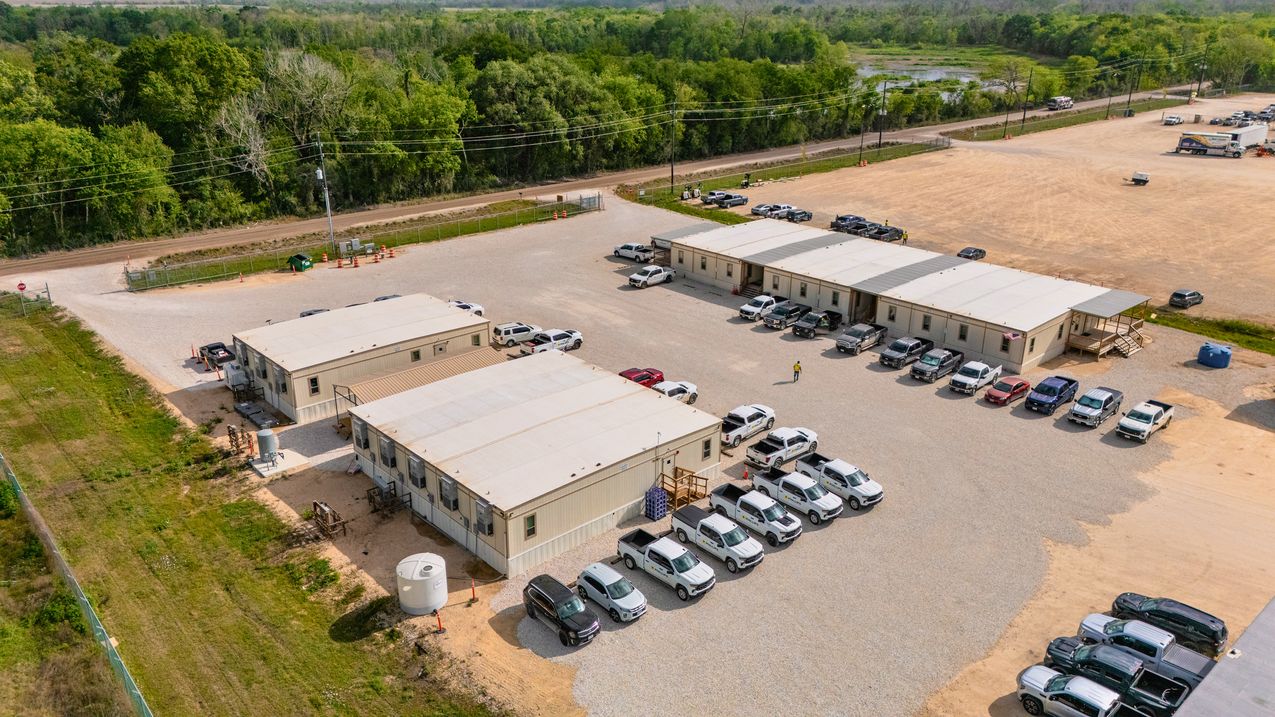Multi-building modular office complex with dedicated workspaces and connected access areas